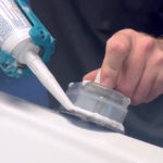 colle à joint autour du clavier de commande